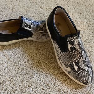 Slip on snakeskin shoes